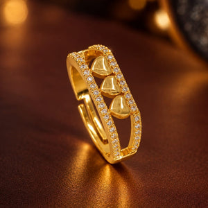 Triple Heart Ring - three gold hearts with stone rails